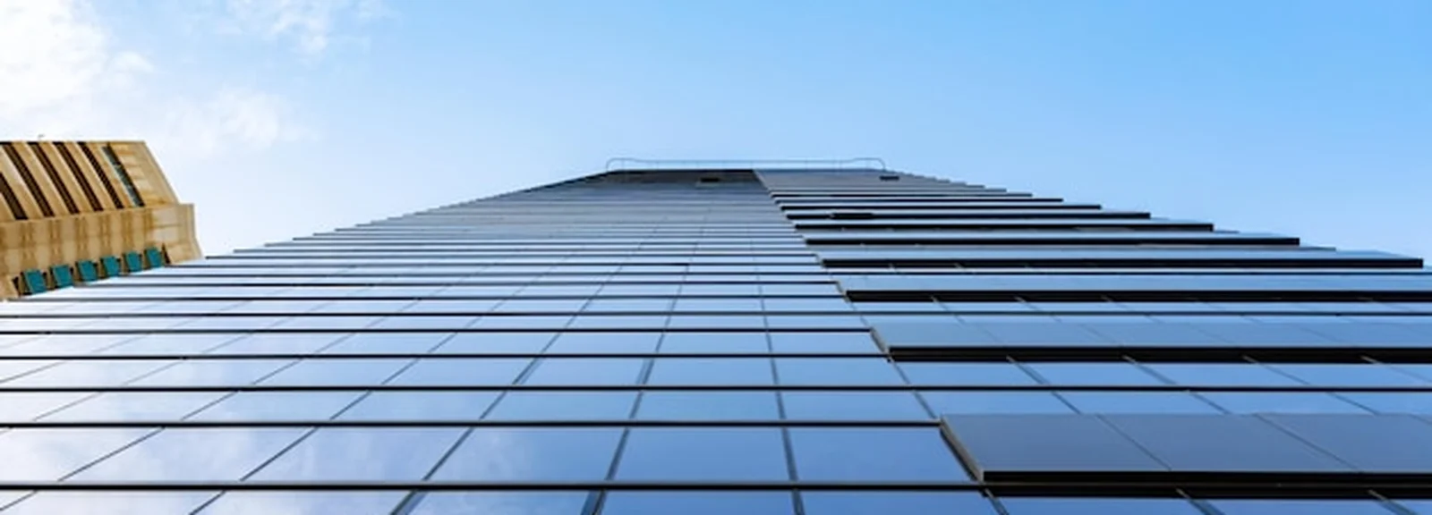 UAE freezone corporate tax — professional flat lay with orange pen and documents